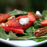 Arugula salad with strawberries and goat cheese Arugula salad with strawberries and goat cheese