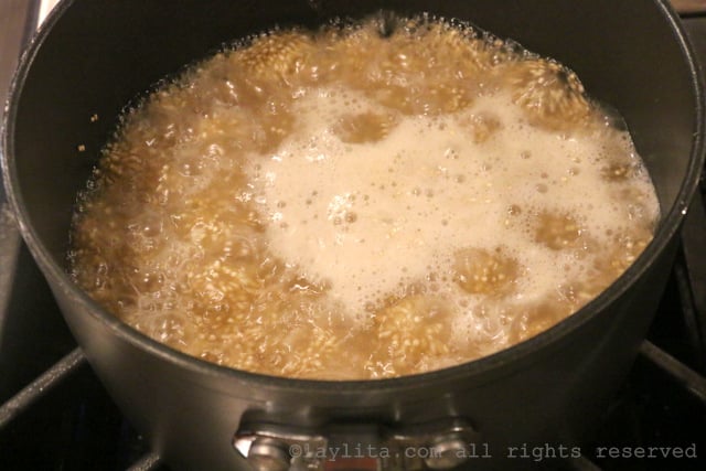 Add the water and bring to a boil, then reduce to heat to low, cover and let it simmer until the quinoa is tender
