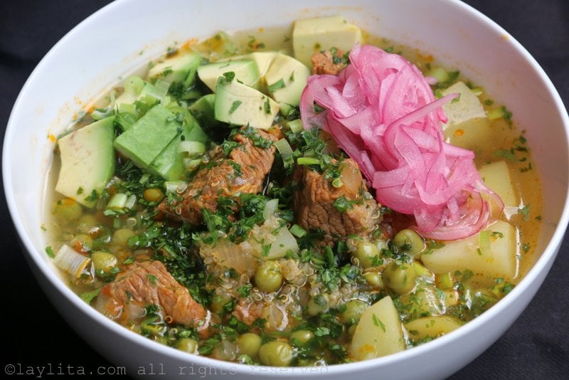 Serve the soup with diced avocado and pickled red onions