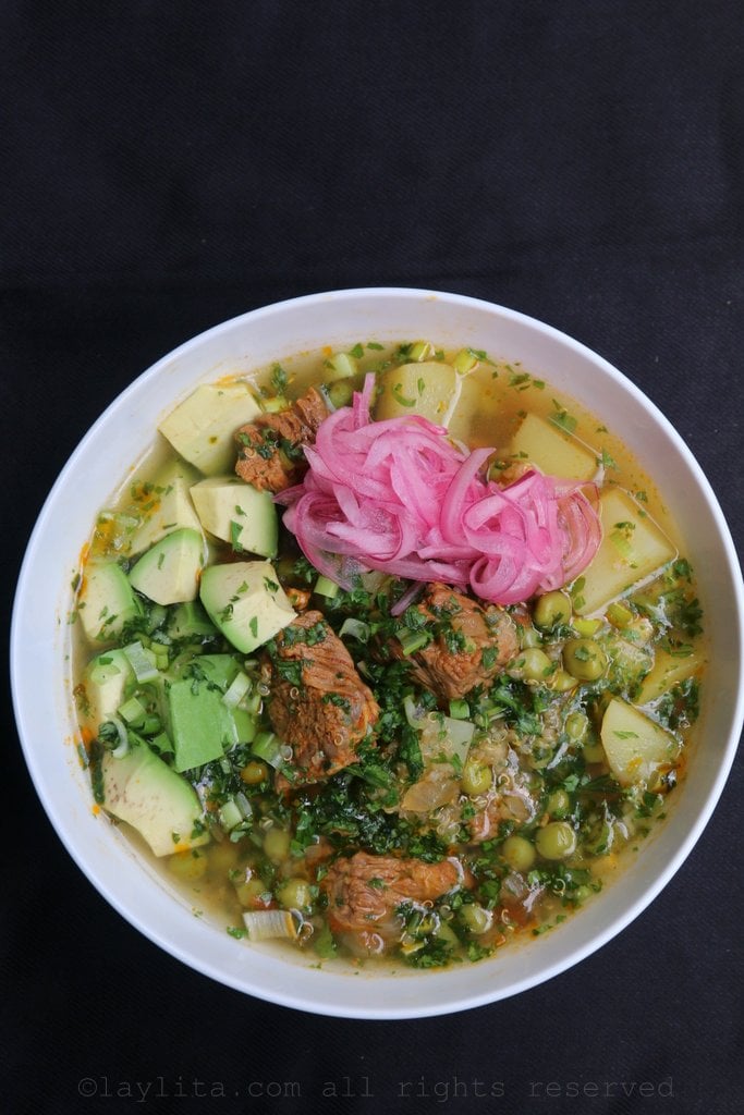 Quinoa, potato and beef soup with avocado and pickled red onions