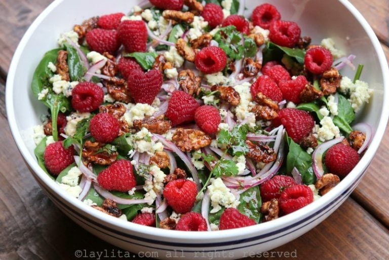 Spinach raspberry salad with gorgonzola and honey roasted walnuts