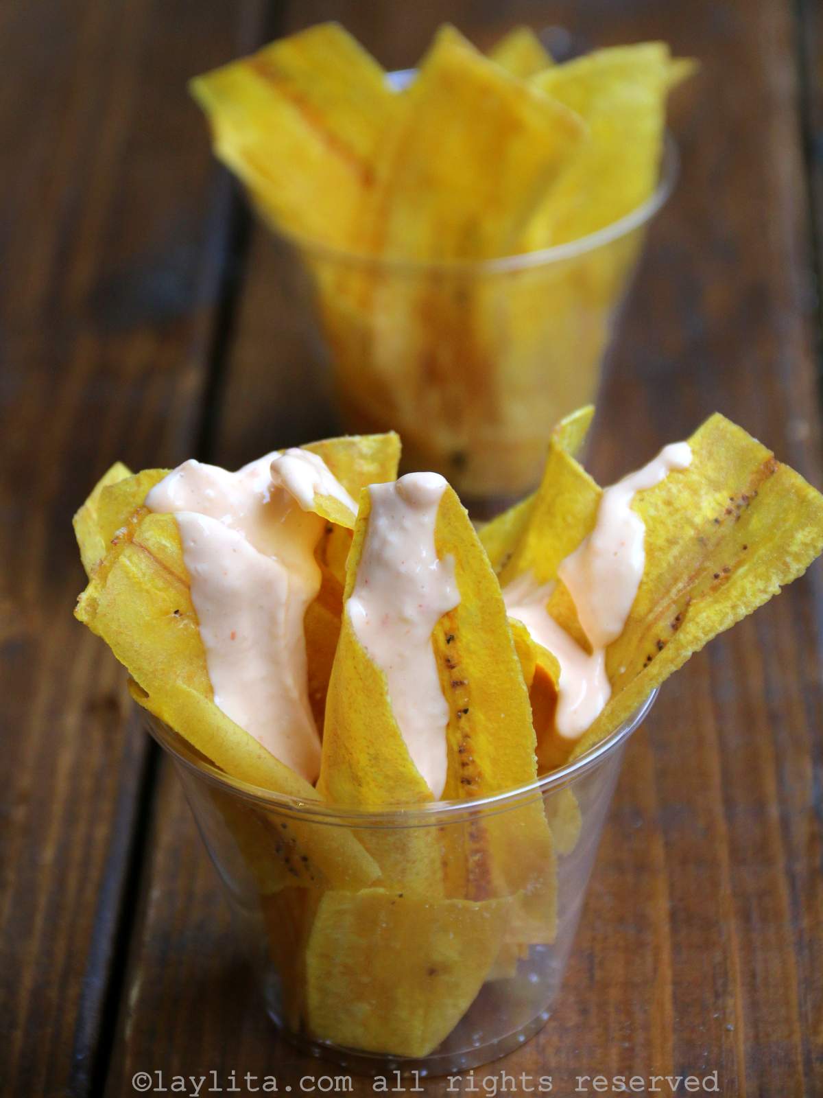 Chifles or plantain chips with homemade salsa rosada