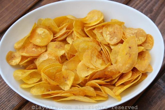 Round cut green plantain chips or chifles, mariquitas, plataninas