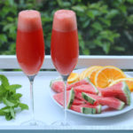 Mimosas made with watermelon and orange juice