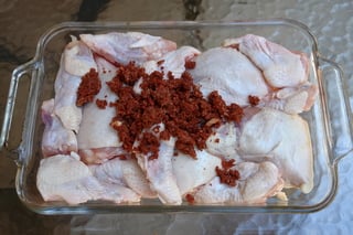 Rub the seasoning mix on the chicken