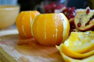 Cutting the oranges into supreme segments
