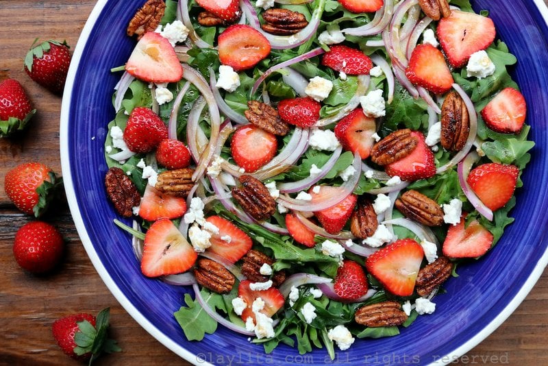 Arugula salad with strawberries, goat cheese, red onion, and pecans