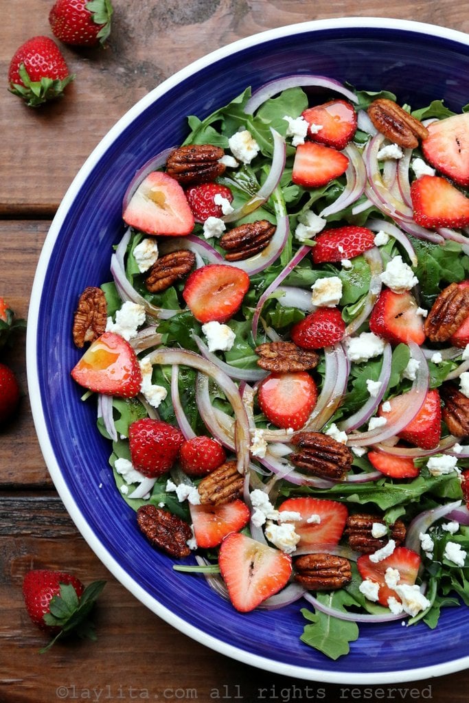Salad with strawberries, goat cheese, arugula, and spicy pecans