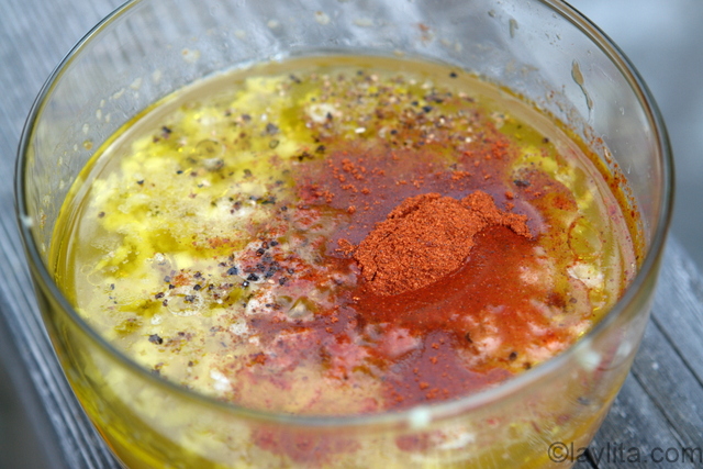 Marinade made with orange juice, white wine, garlic, achiote or annatto, lemon pepper and olive oil