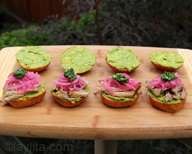 Roast pork sliders with avocado and pickled red onions