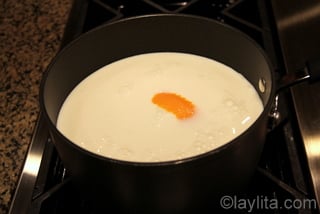 1- Cook milk, sugar, vanilla and orange peel for about 30 minutes