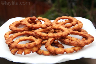 14 - Place the fried pristiños on paper towels to drain any excess oil