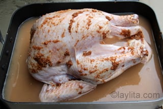 4- Pour the chicha over the turkey and marinate overnight