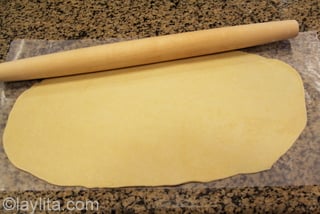 7- Roll the dough into a long thin sheet