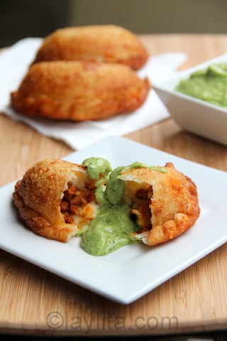 Choriqueso empanadas with avocado sauce