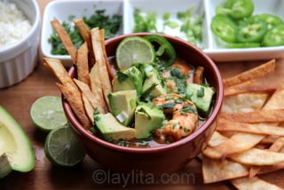 Shrimp tortilla soup with avocado