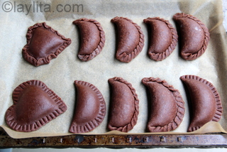 Use a fork to seal the chocolate empanadas or gently twist the edges with your fingers