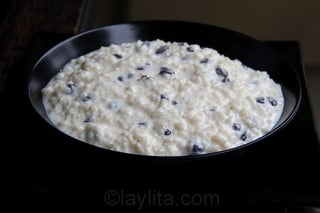 Arroz con leche can be served family style in a large bowl.