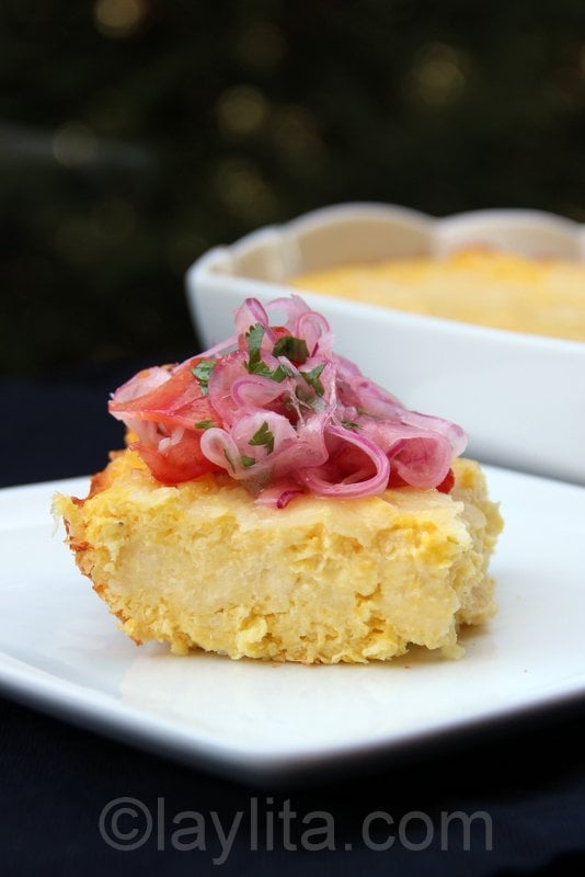 Pastel de choclo or savory corn cake with tomato and onion salsa