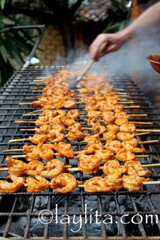 Baste shrimp with achiote butter as needed