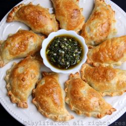 Spring vegetable empanadas filled with asparagus, fava beans, peas, and goat cheese