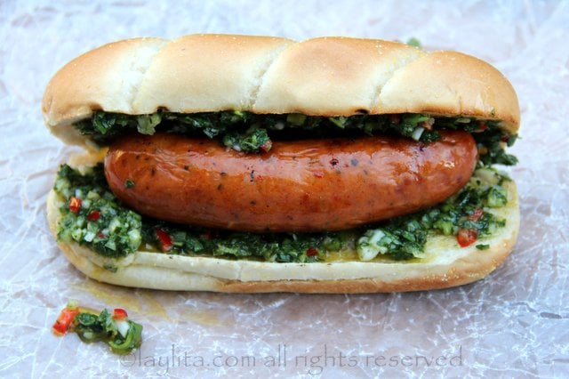 Choripan or chorizo hot dog with chimichurri sauce