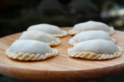 Seal the empanadas using a fork or making a curled type seal on the edges