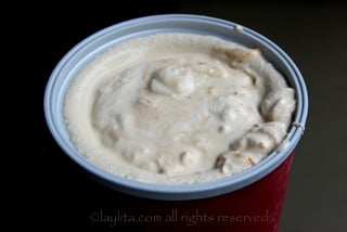 Prepare the ice cream using your ice cream maker or with a mixer or food processor. Add the dulce de leche at the end.