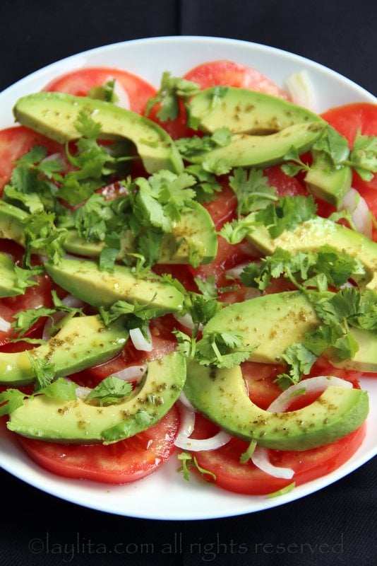 Quick salad idea: sliced tomatoes, sliced avocados, a few onions, cilantro leaves and drizzle with lime, olive oil and salt