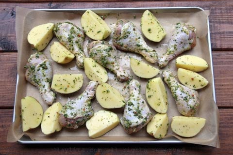 Place the chicken pieces and any vegetables on baking pan