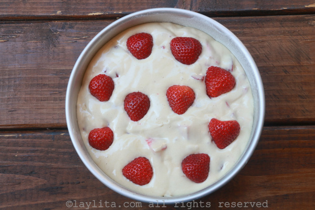 Add strawberries on top before baking
