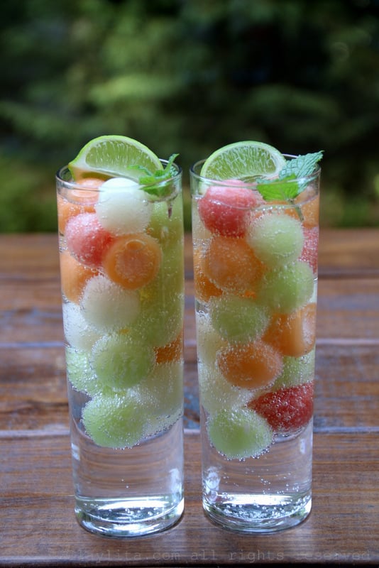 Refreshing sparkling water with melon ball ice cubes