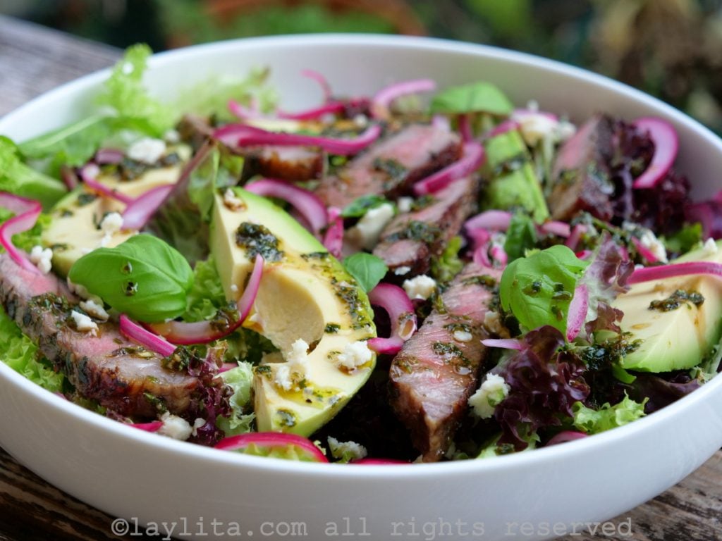 Easy steak salad with blue cheese, avocado, and basil balsamic dressing