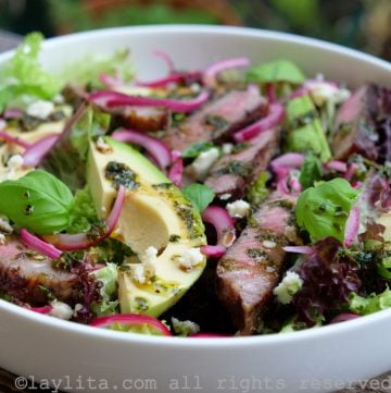 Easy steak salad with blue cheese, avocado, and basil balsamic dressing