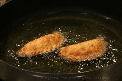 Fry the empanadas in hot oil for about 1-2 minutes