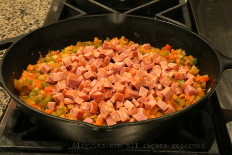 Add the diced Andouille sausage