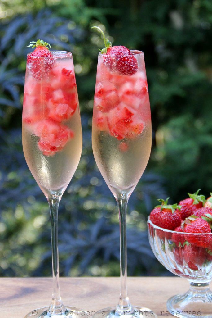 Glasses of champagne with strawberries