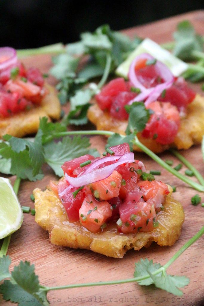 Patacones or tostones topped with tuna and salmon ceviche