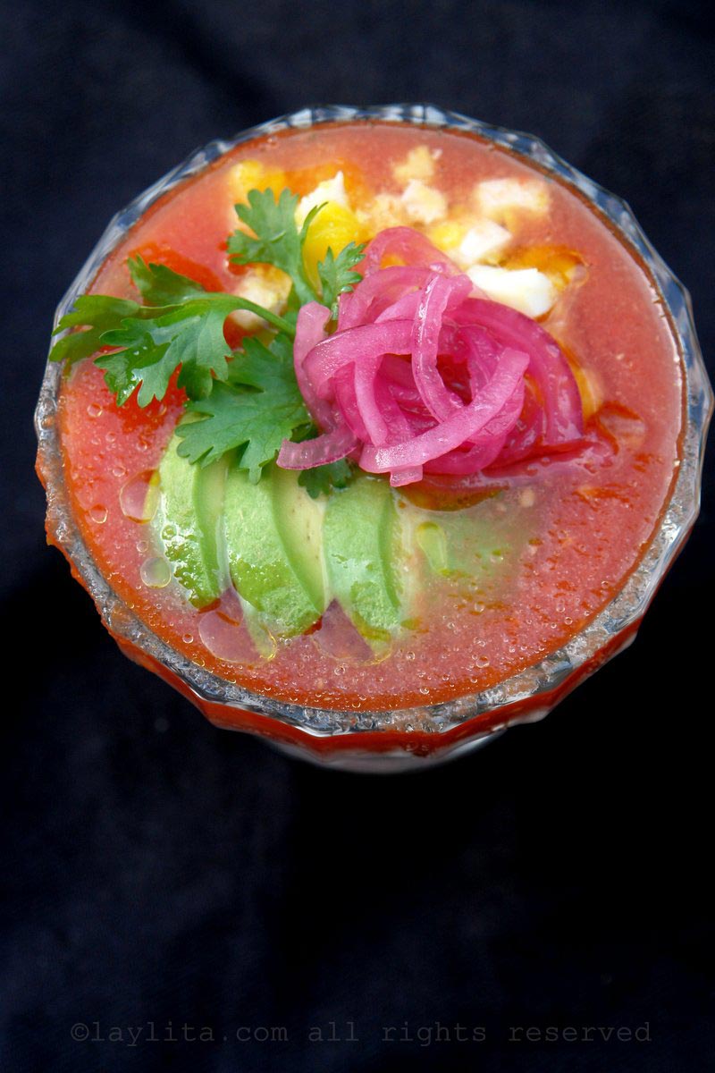Gazpacho with avocado, pickled red onions, and diced hard boiled egg