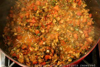 Stir in the diced tomatoes and continue cooking