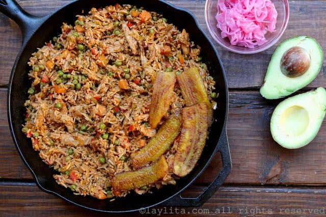 Serve the rice with chicken or turkey with fried plantains, avocado, and a side salad
