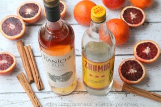 Use rum or aguardiente to spike the blood orange drink