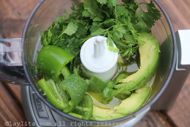 Place the ingredients for the avocado salad dressing in a small food processor or blender