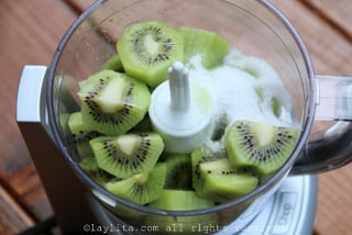 Place the kiwis with the sugar or simple syrup with lime juice in the blender or food processor