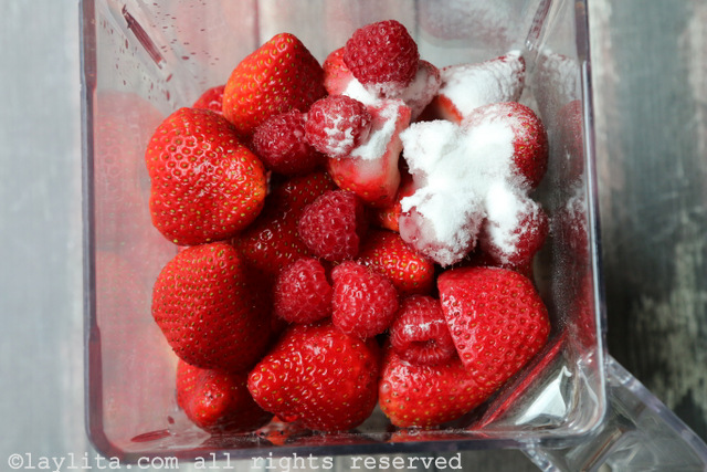 Blend the strawberries and raspberries s with the sugar and water.