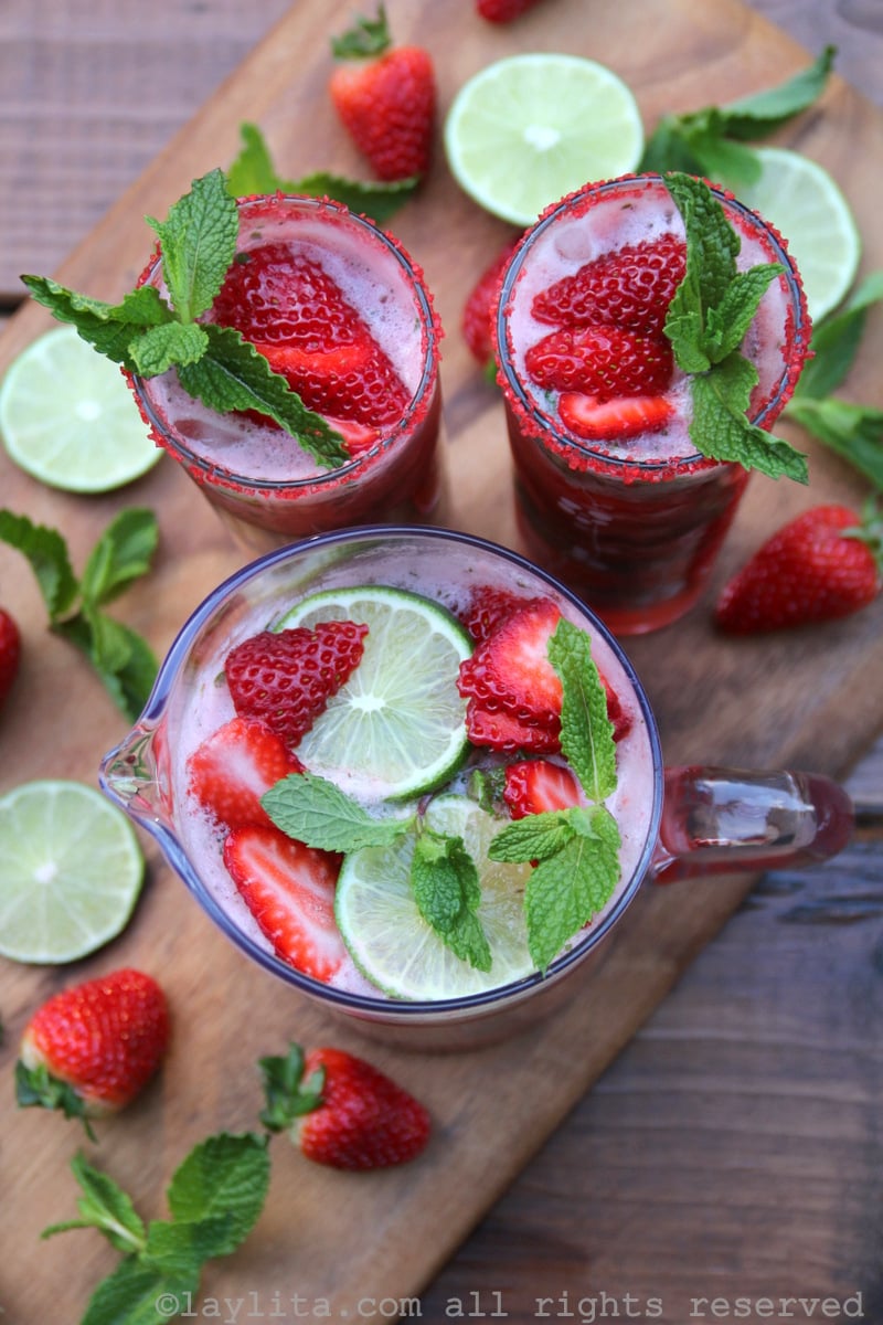 Mojitos with fresh strawberries and mint