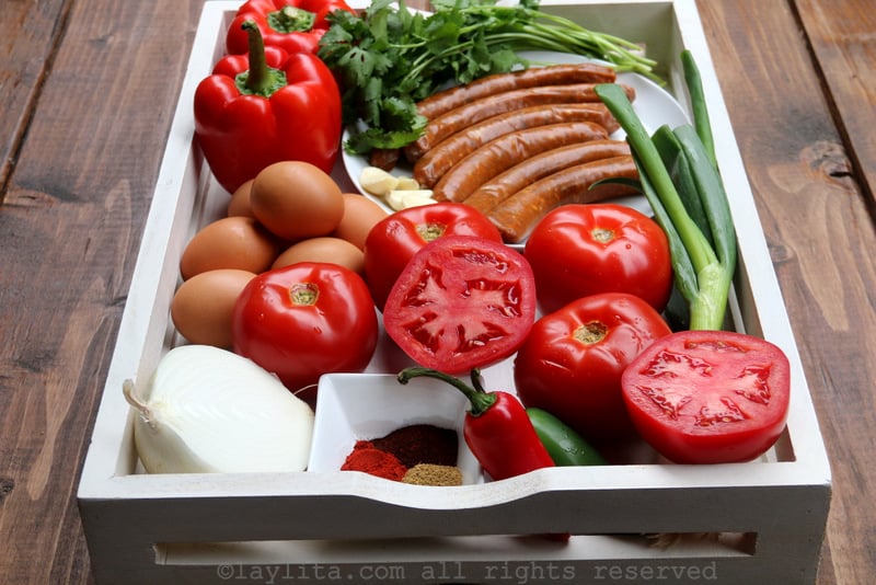 Ingredients for a spicy shakshuka with merguez or chorizo sausage