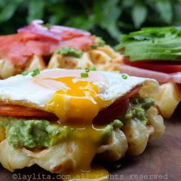 Cheesy cassava waffles with avocado and egg