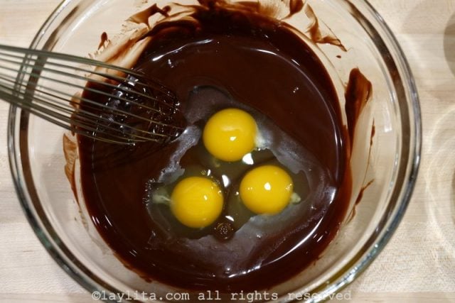 Use a whisk to mix in the eggs