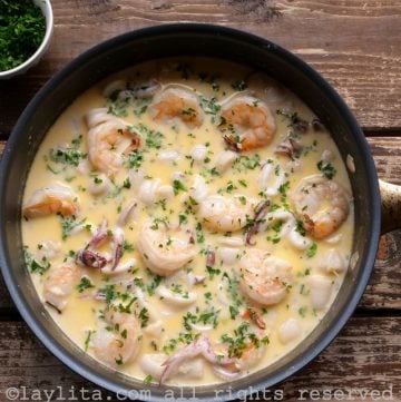 Mixed seafood in a creamy garlic wine sauce